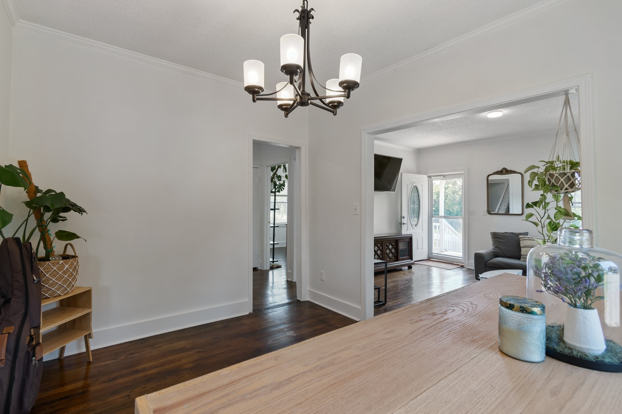 4711 Ollie Chunn Road Spring Hill, TN 37174 - Photo 15 of 64 a view of a dining room with furniture and a chandelier fan