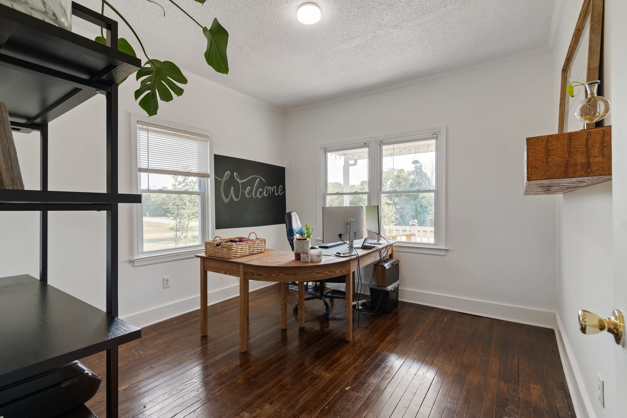 4711 Ollie Chunn Road Spring Hill, TN 37174 - Photo 29 of 64 a view of a dining room with furniture window and wooden floor