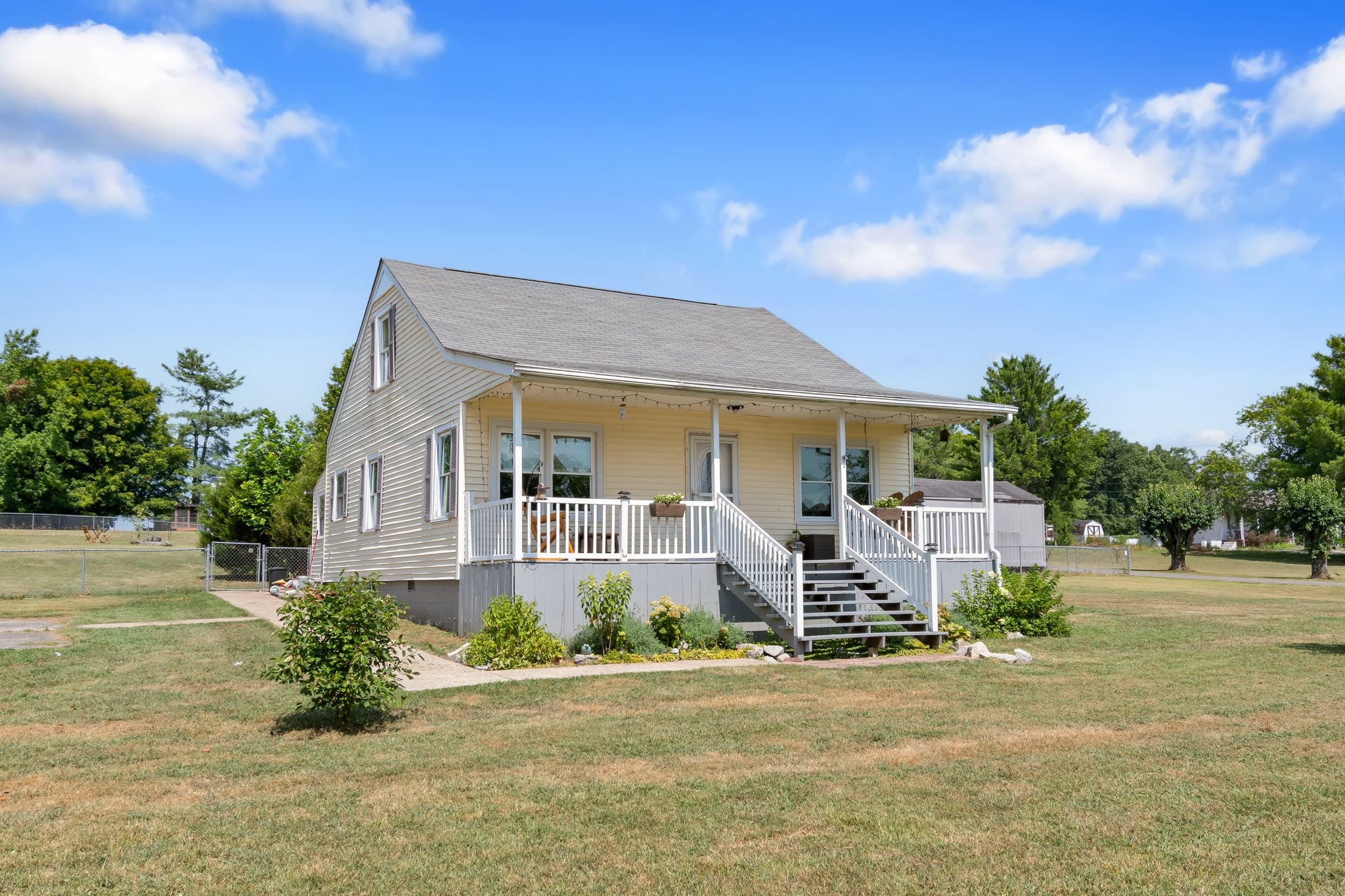 4711 Ollie Chunn Road Spring Hill, TN 37174 - Photo 3 of 64 a front view of a house with a yard