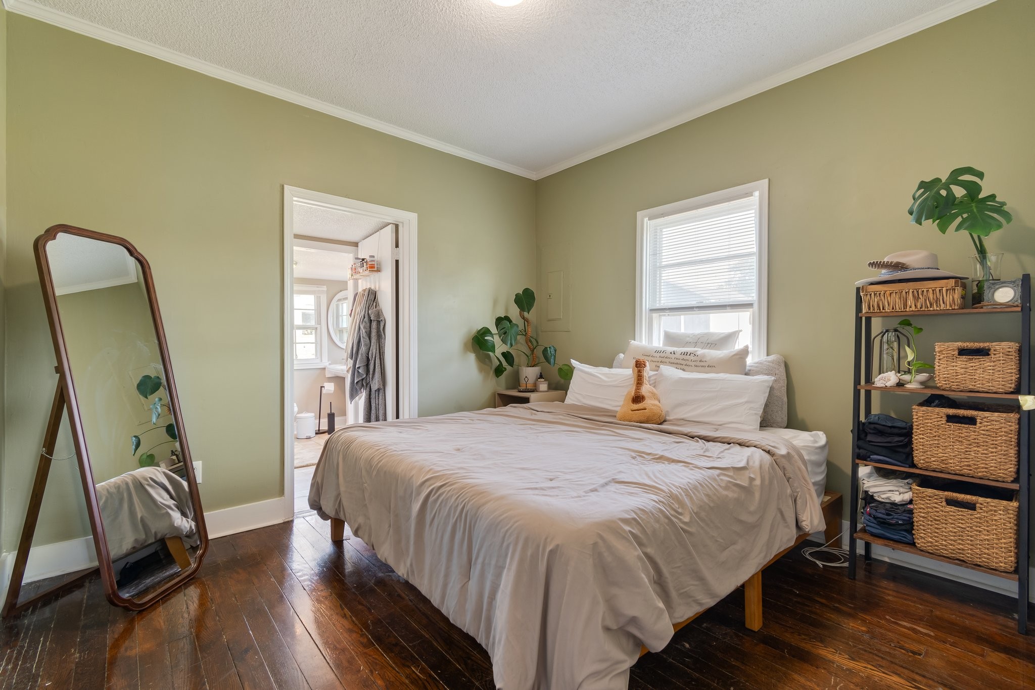 4711 Ollie Chunn Road Spring Hill, TN 37174 - Photo 31 of 64 a bedroom with a bed and wooden floor