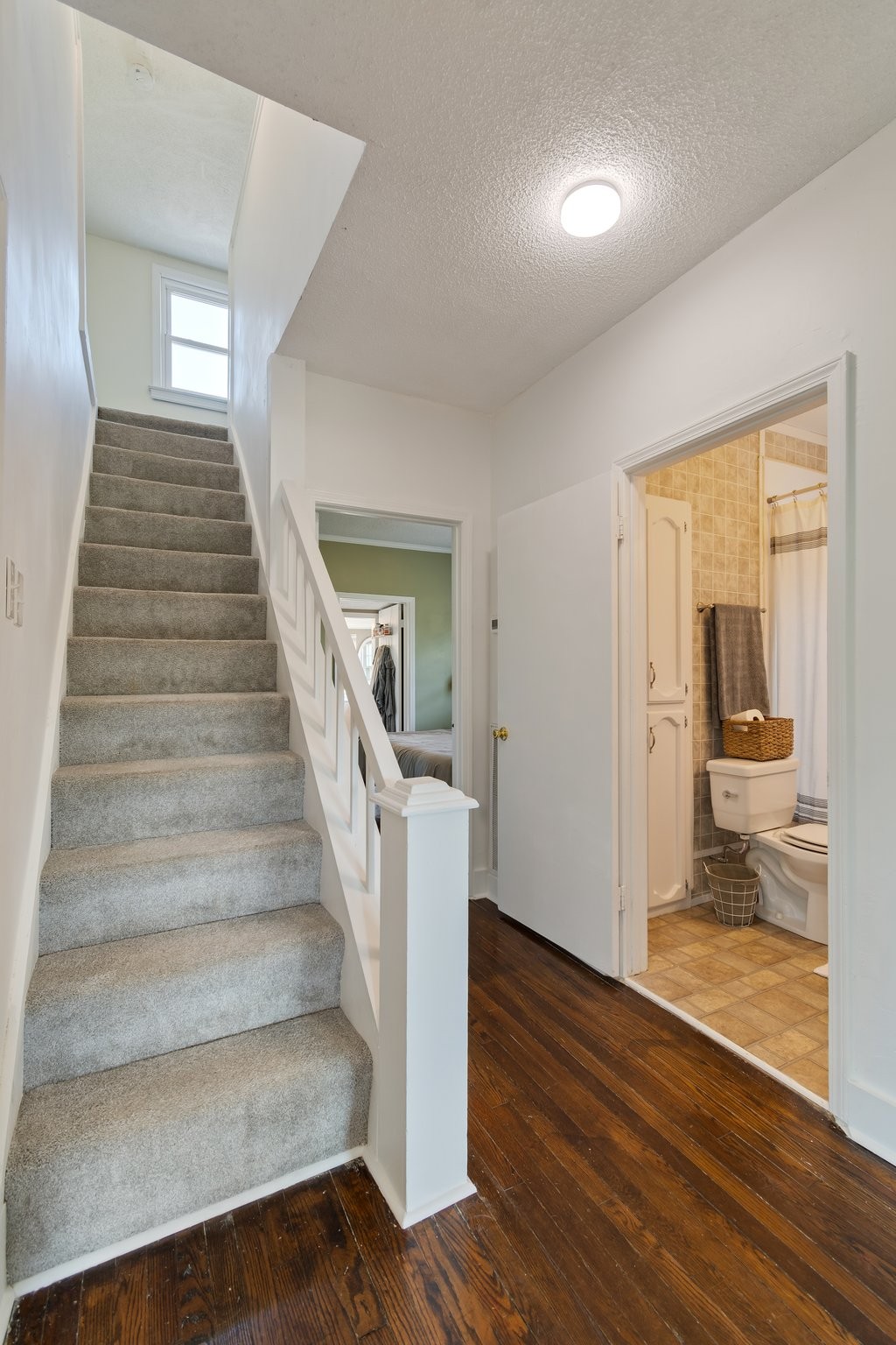 4711 Ollie Chunn Road Spring Hill, TN 37174 - Photo 35 of 64 a view of an entryway with wooden floor and a livingroom