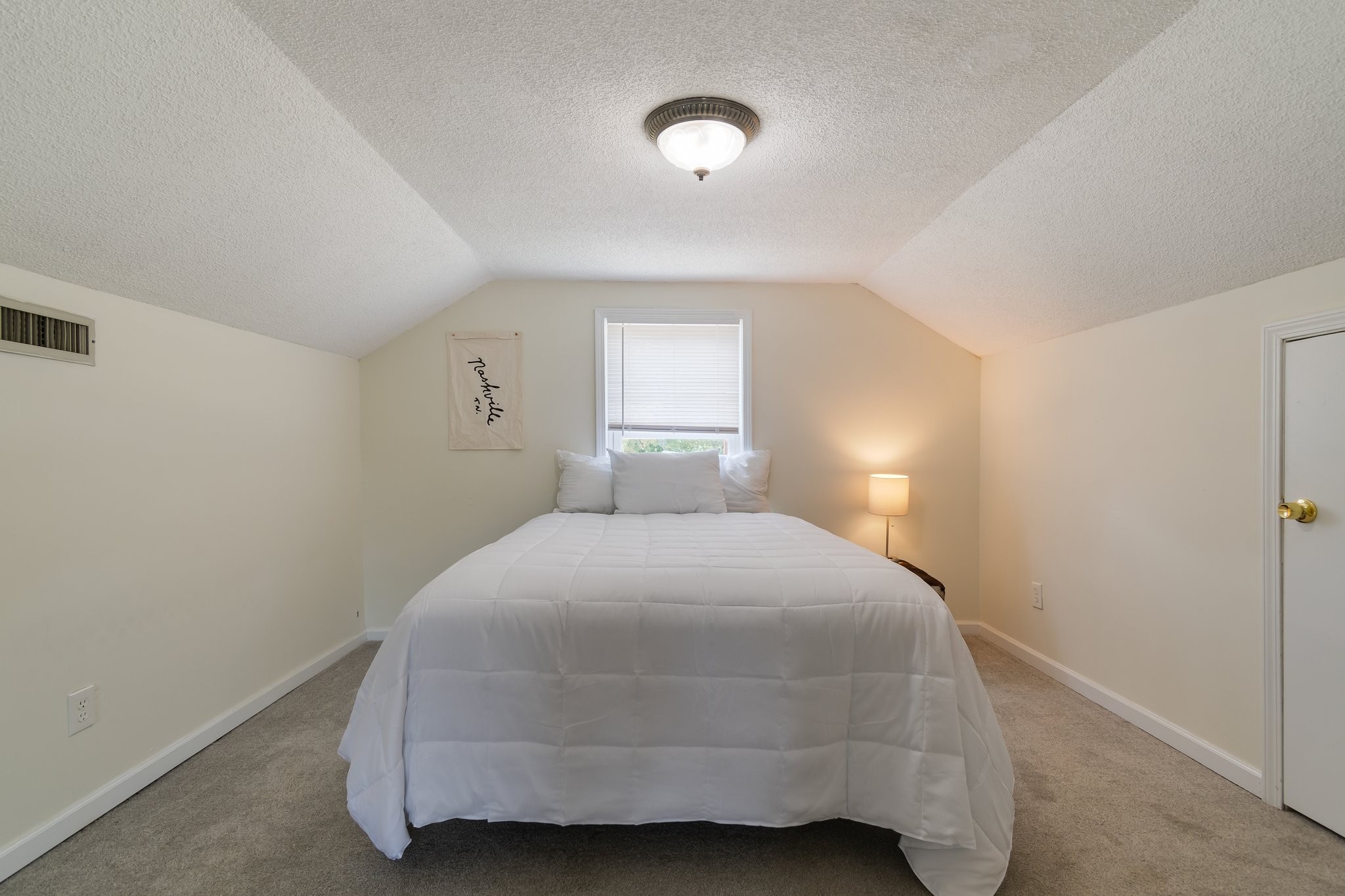 4711 Ollie Chunn Road Spring Hill, TN 37174 - Photo 38 of 64 a bedroom with a bed and a window