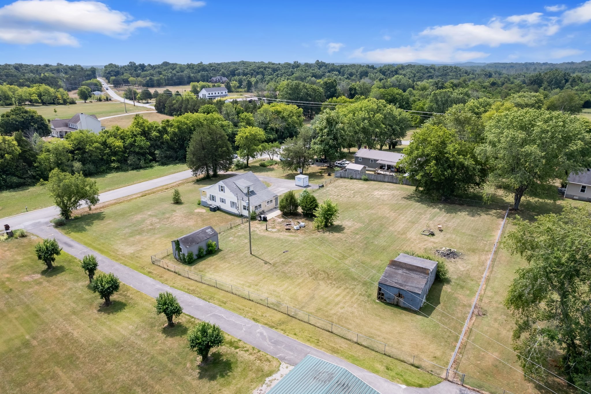 4711 Ollie Chunn Road Spring Hill, TN 37174 - Photo 56 of 64 a view of a terrace with a yard