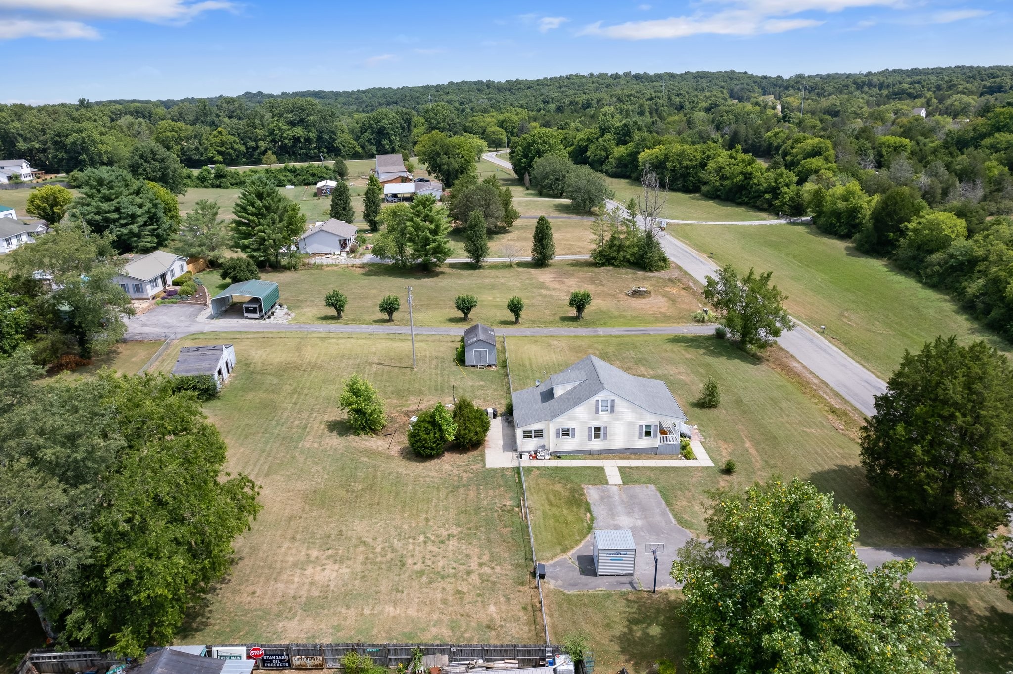 4711 Ollie Chunn Road Spring Hill, TN 37174 - Photo 57 of 64 an aerial view of a house with a garden