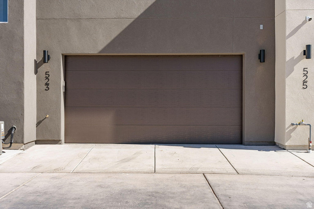 523 West Olive Lane St. George, UT 84790 - Photo 37 of 47 Garage featuring concrete driveway