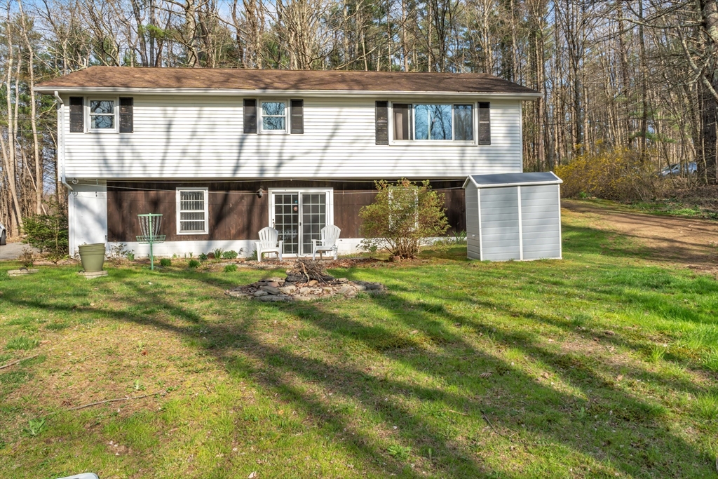 10 Blodgett Road Holland, MA 01521 - Photo 25 of 25 front view of a house with a yard