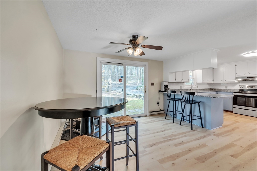 10 Blodgett Road Holland, MA 01521 - Photo 9 of 25 a view of a dining room with furniture and a table