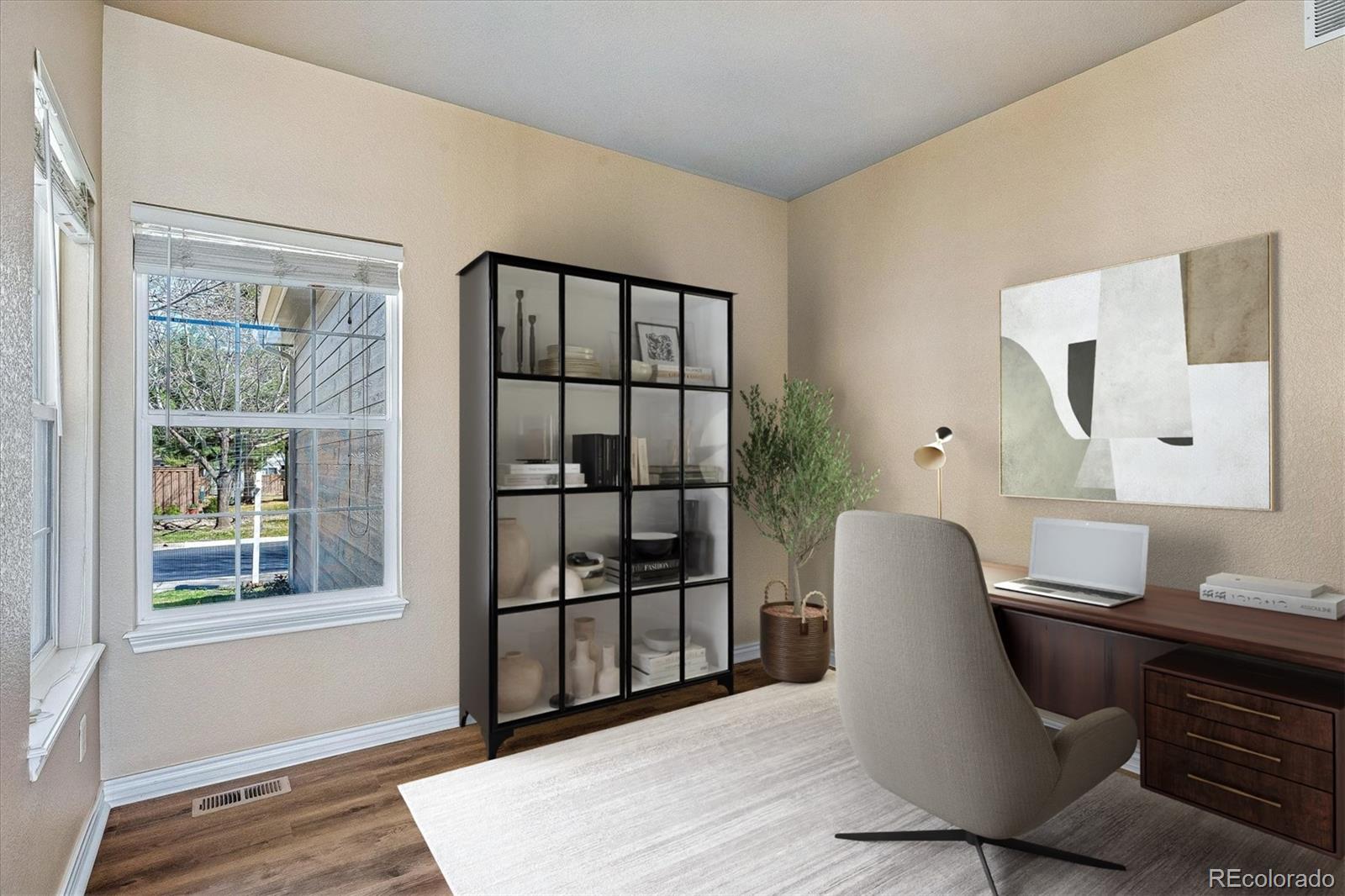 4545 South Taft Way Morrison, CO 80465 - Photo 6 of 24 a workspace with wooden floor and a window
