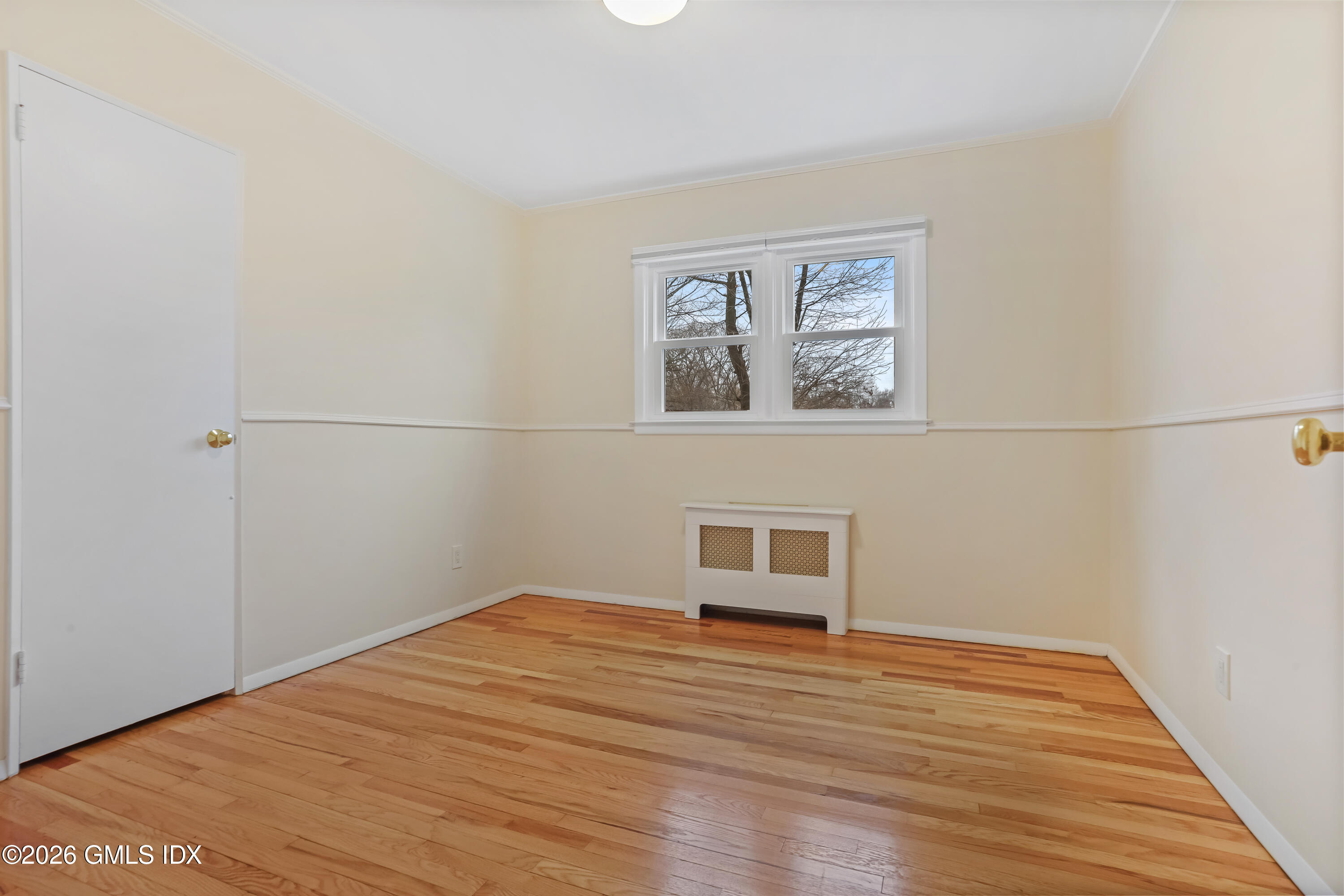 45 Sound Beach Ave Extension Riverside, CT 06878 - Photo 14 of 31 a view of a room with wooden floor