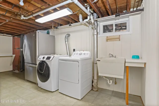 a utility room with dryer and washer