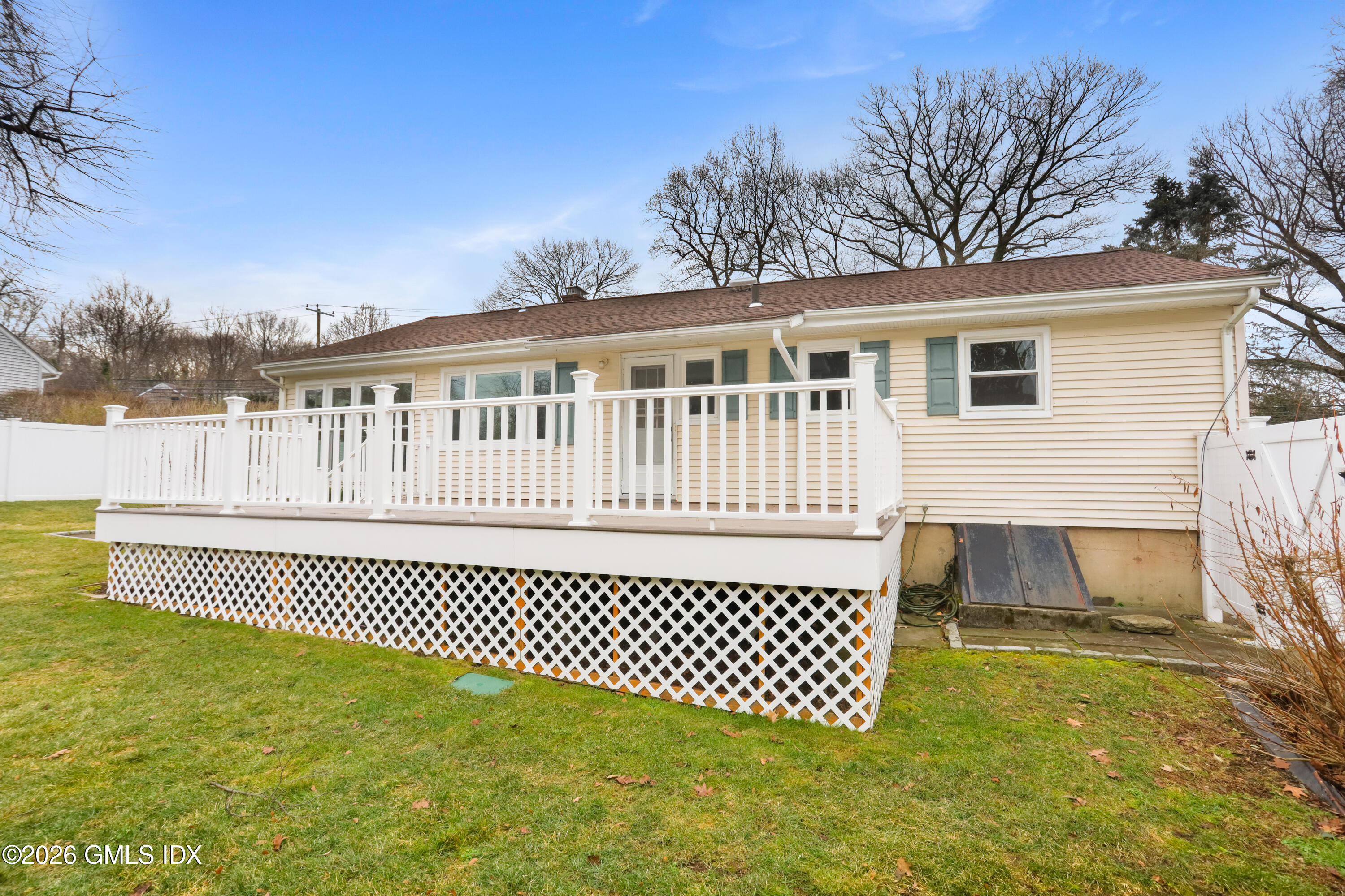 45 Sound Beach Ave Extension Riverside, CT 06878 - Photo 25 of 31 a view of a house with a deck