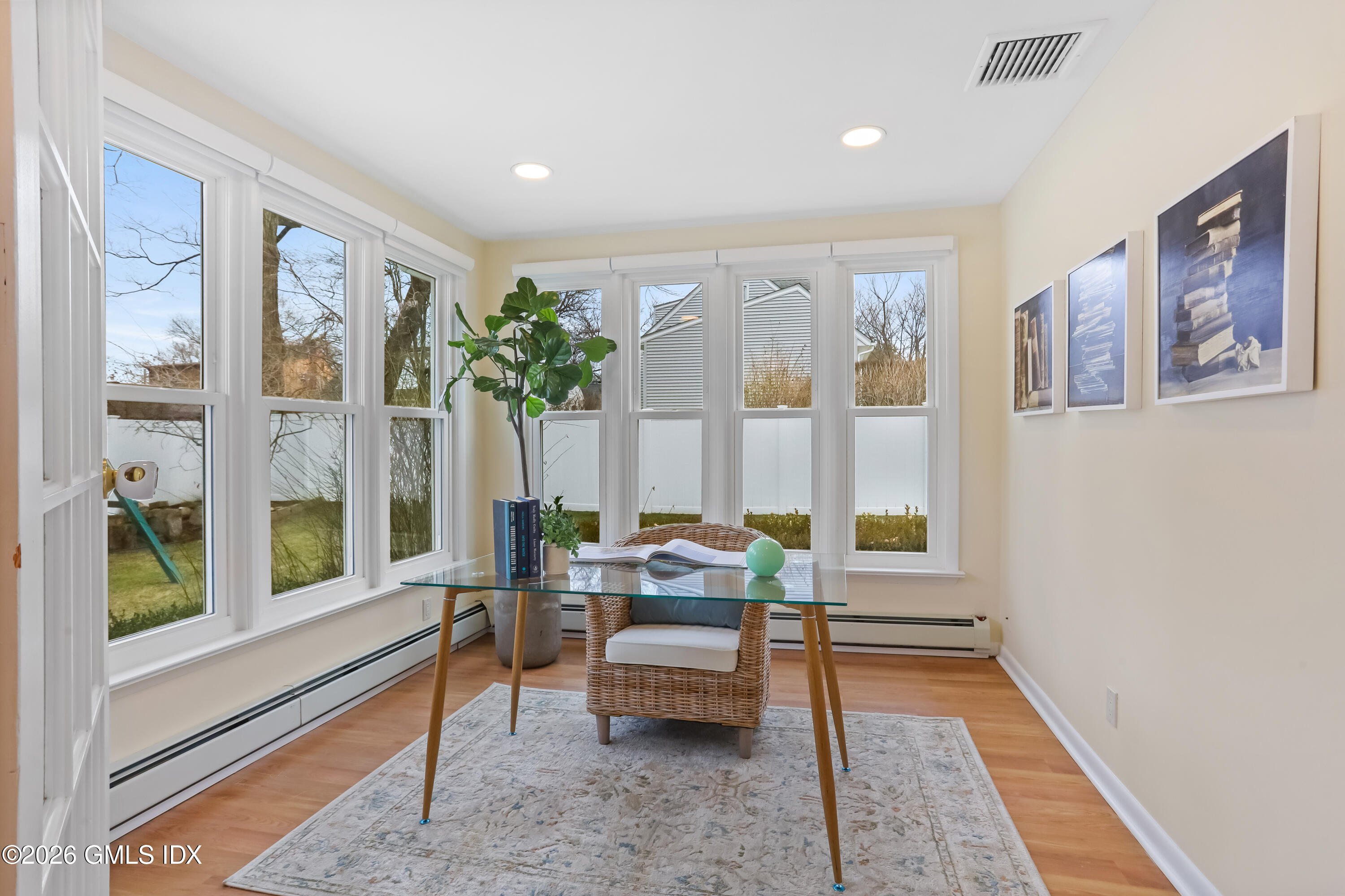 45 Sound Beach Ave Extension Riverside, CT 06878 - Photo 9 of 31 a living room with furniture and a large window with outer view