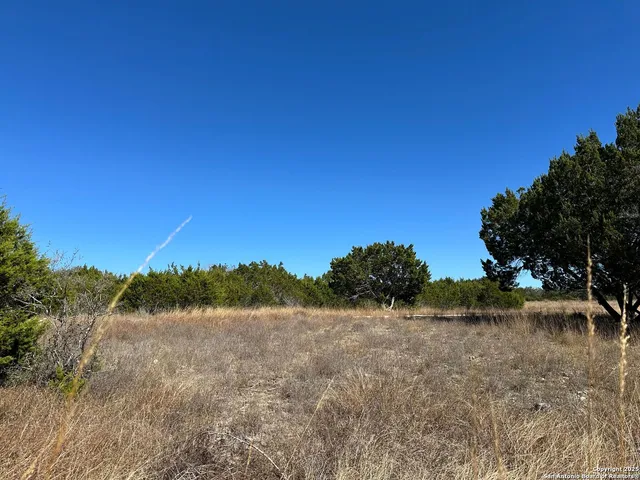 a view of mountain with lake view