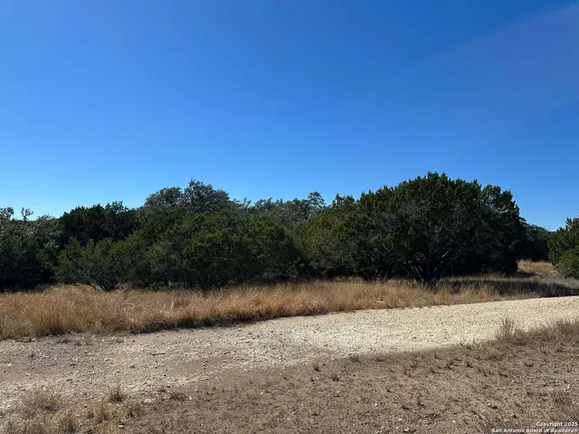 a view of mountain with lake view