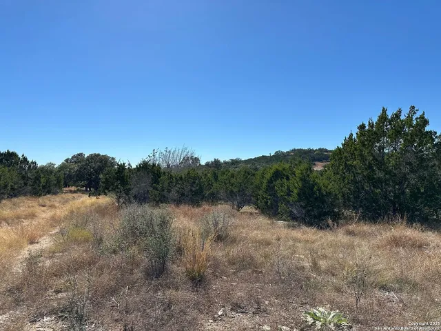 a view of a lake with mountain in the back