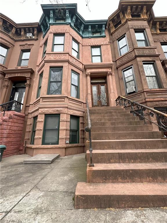 467 56th Street Brooklyn, NY 11220 - Photo 1 of 8 a view of a building with a bench