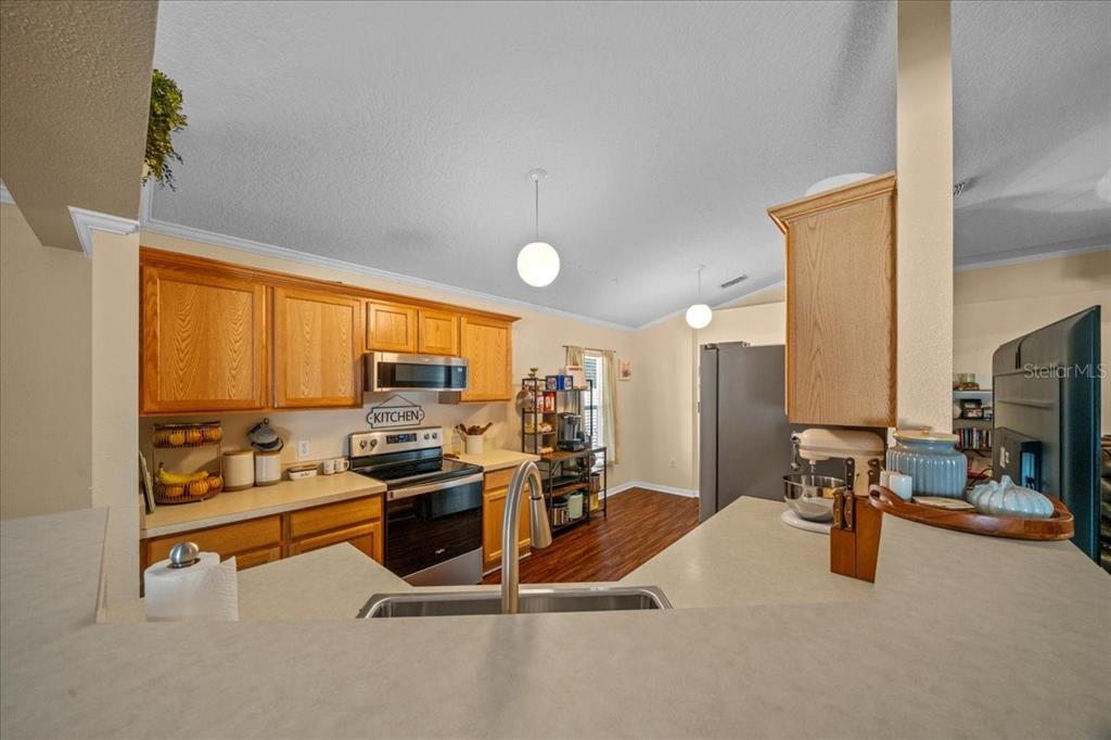 49 Hemlock Radial Loop Ocala, FL 34472 - Photo 18 of 50 a view of a room with gym equipment