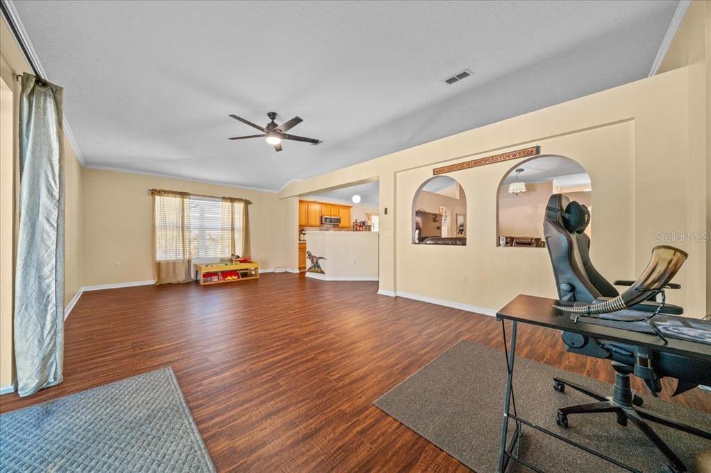 49 Hemlock Radial Loop Ocala, FL 34472 - Photo 20 of 50 a view of a room with gym equipment