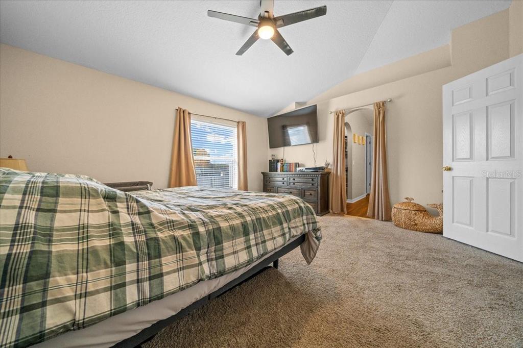 49 Hemlock Radial Loop Ocala, FL 34472 - Photo 25 of 50 a bedroom with a bed and window