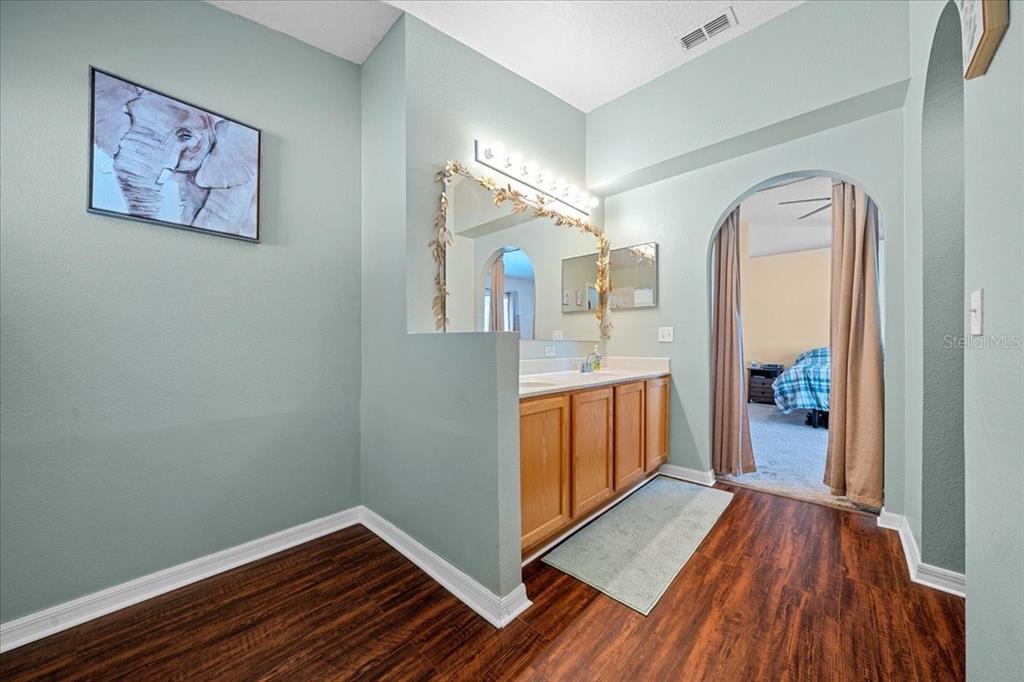 49 Hemlock Radial Loop Ocala, FL 34472 - Photo 26 of 50 a view of hallway with wooden floor