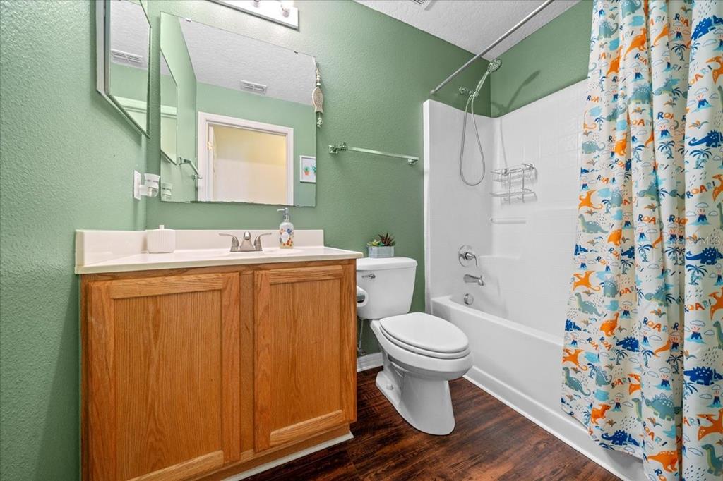 49 Hemlock Radial Loop Ocala, FL 34472 - Photo 34 of 50 a bathroom with a sink toilet and shower