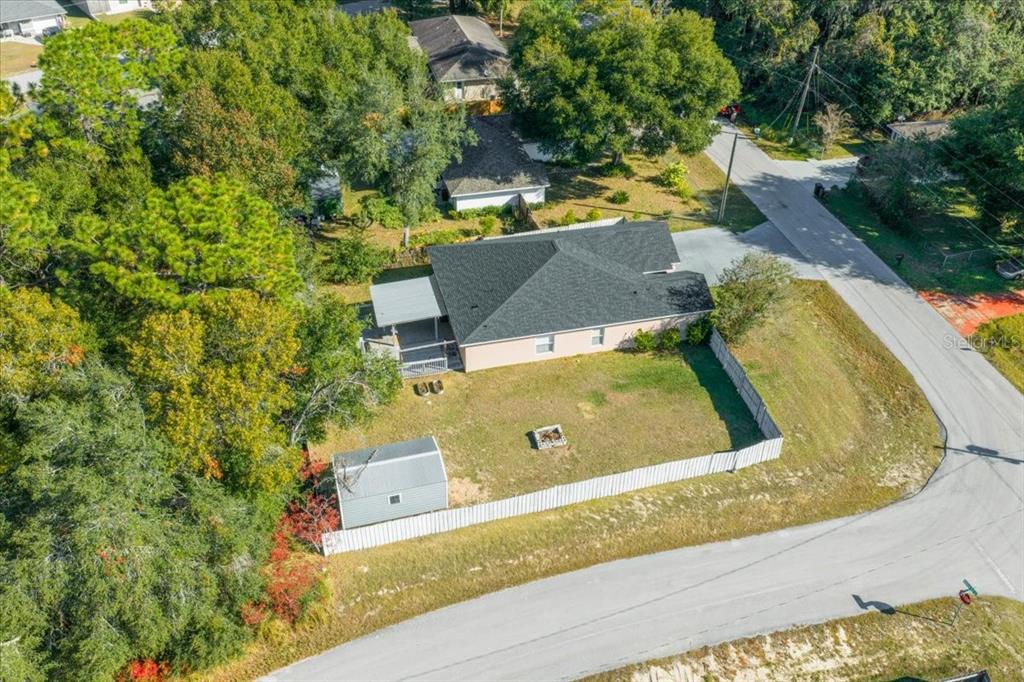 49 Hemlock Radial Loop Ocala, FL 34472 - Photo 45 of 50 an aerial view of a house with a swimming pool