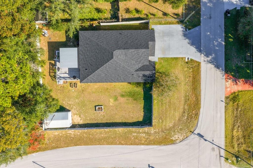 49 Hemlock Radial Loop Ocala, FL 34472 - Photo 46 of 50 an aerial view of a house with a swimming pool