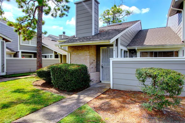a view of a house with a garden