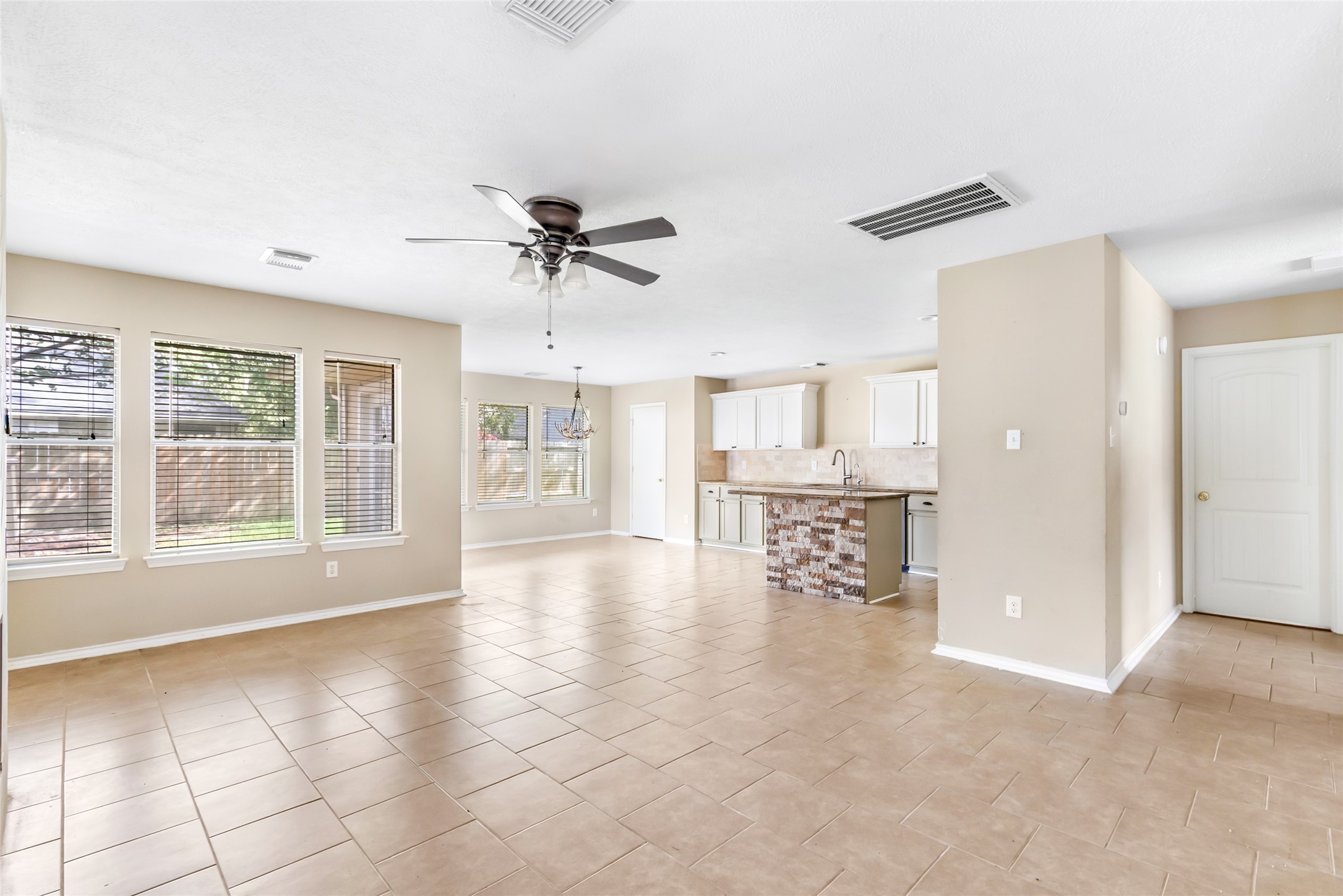 19226 Pinewood Mist Lane Humble, TX 77346 - Photo 14 of 33 a view of an empty room with a window