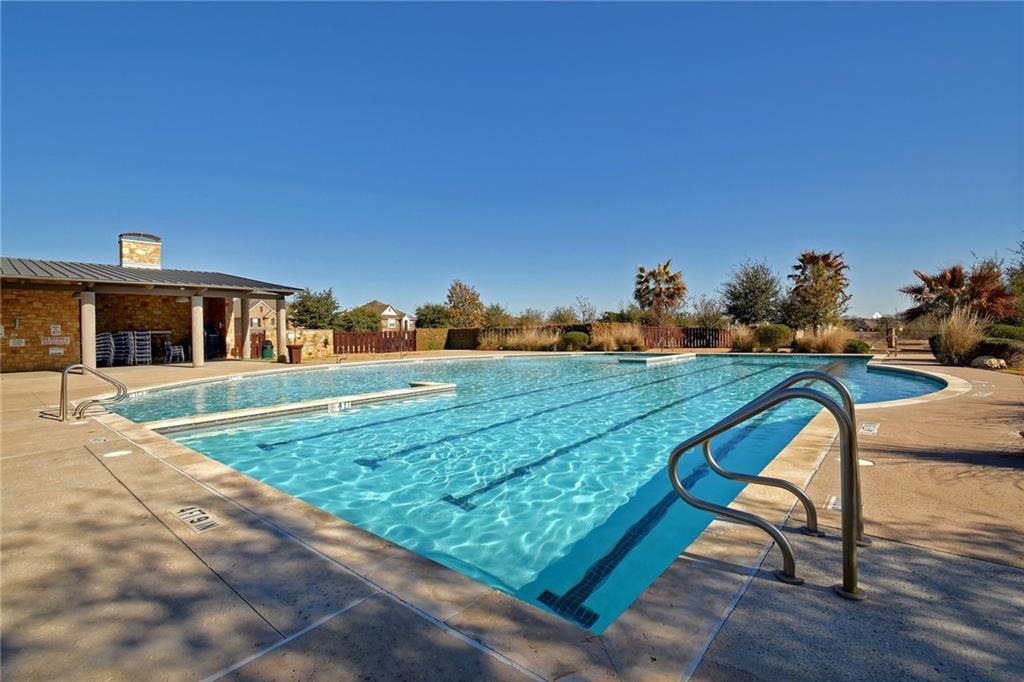 351 Wincliff Drive Buda, TX 78610 - Photo 36 of 40 A sparkling community pool offers aquatic recreation under the open sky.