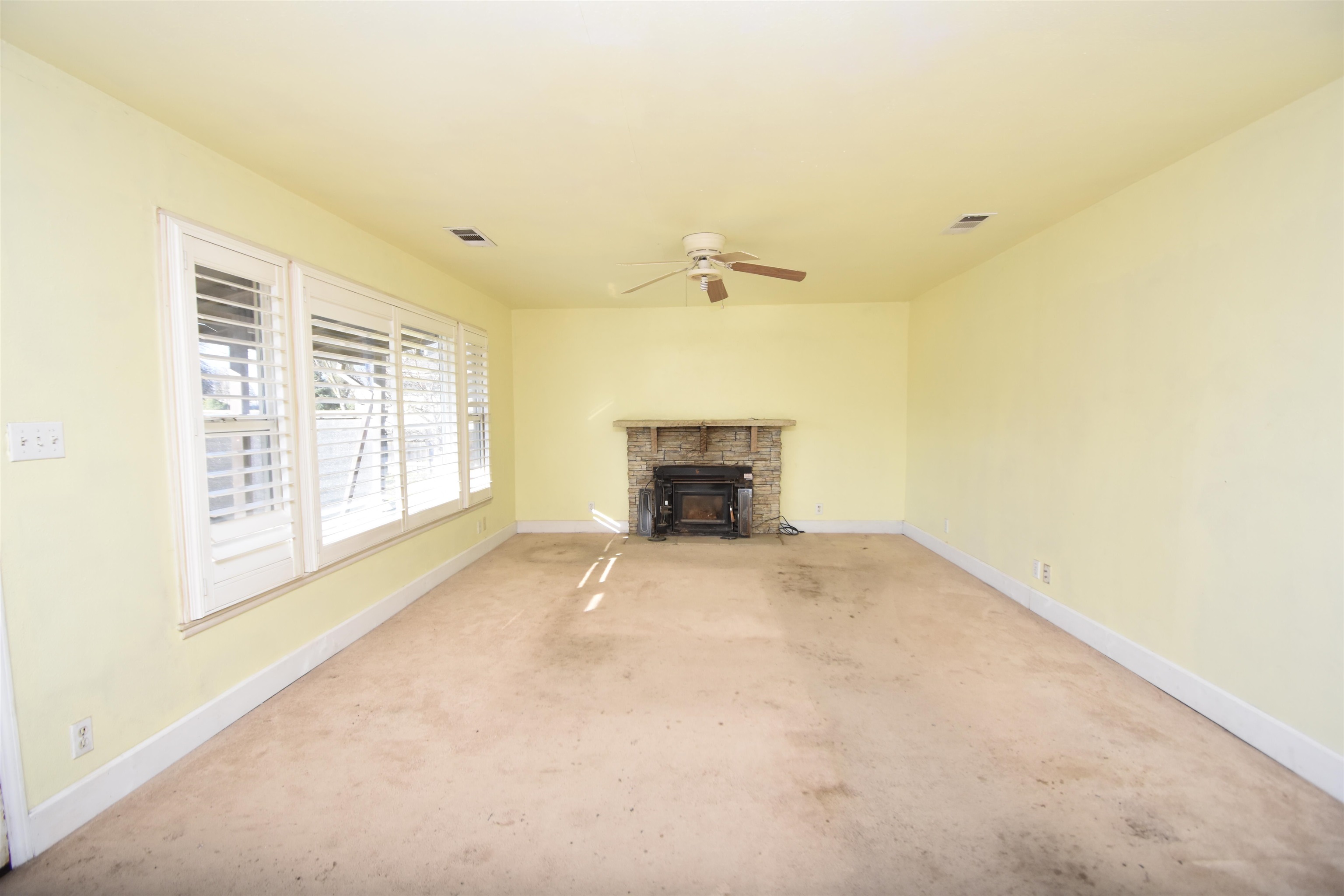 5100 Kiernan Avenue Salida, CA 95368 - Photo 18 of 30 a view of empty room with a fireplace