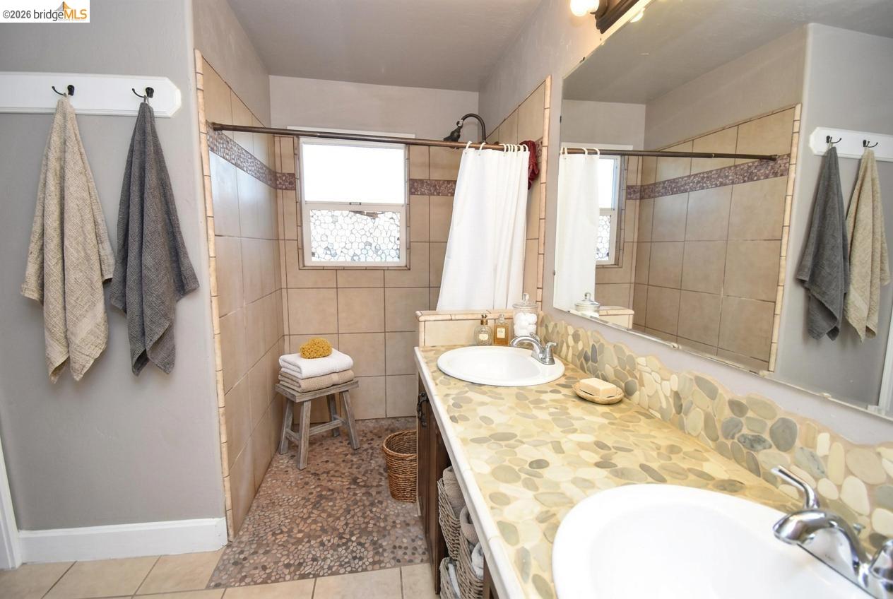 5100 Kiernan Avenue Salida, CA 95368 - Photo 27 of 45 a bathroom with a sink and a mirror