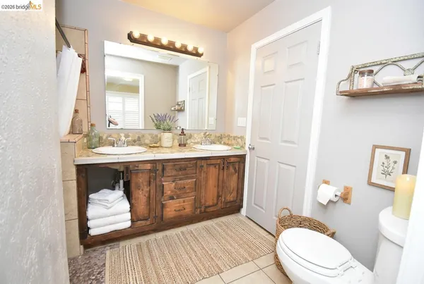 a bathroom with a toilet and a sink