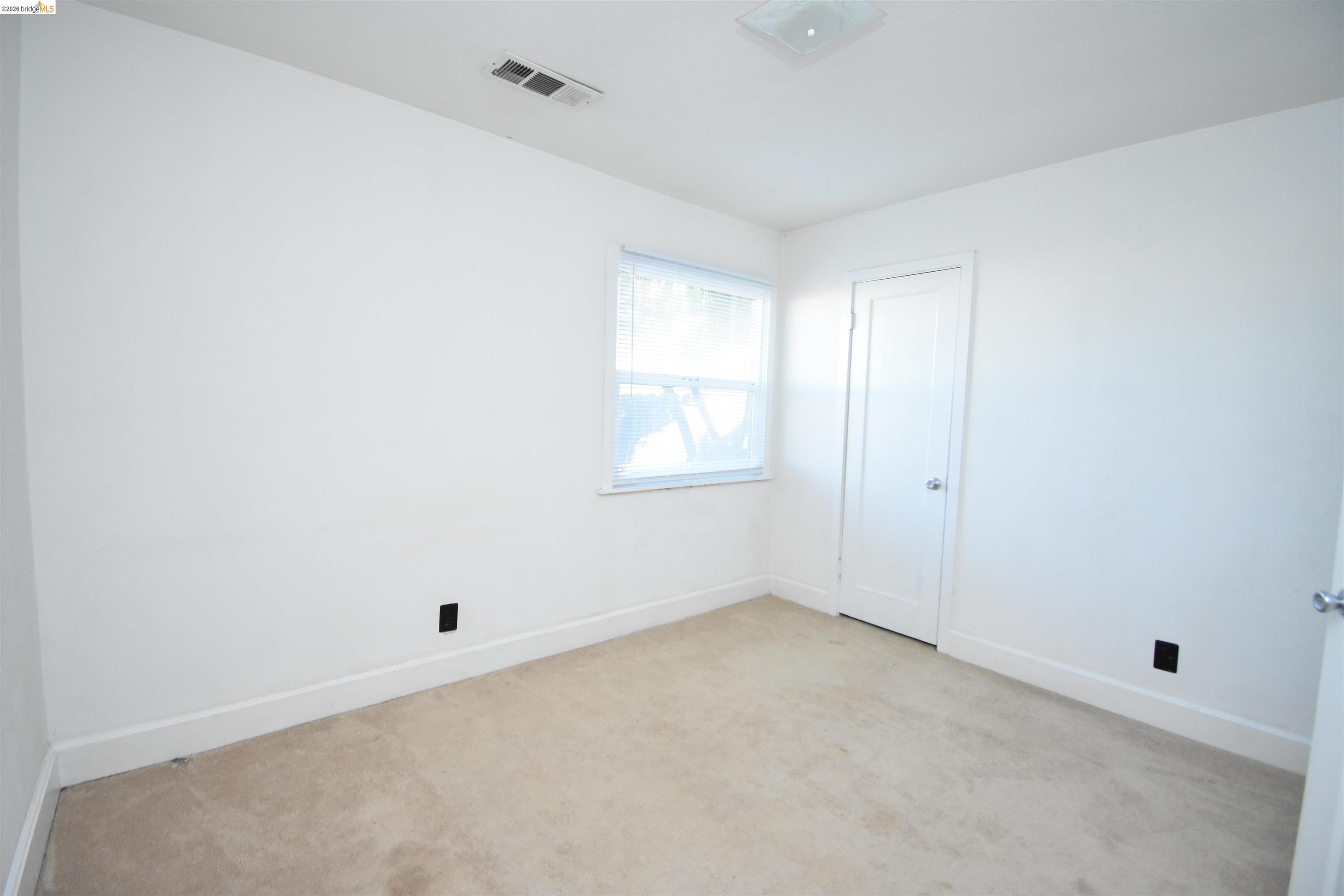 5100 Kiernan Avenue Salida, CA 95368 - Photo 32 of 45 a view of an empty room with a window