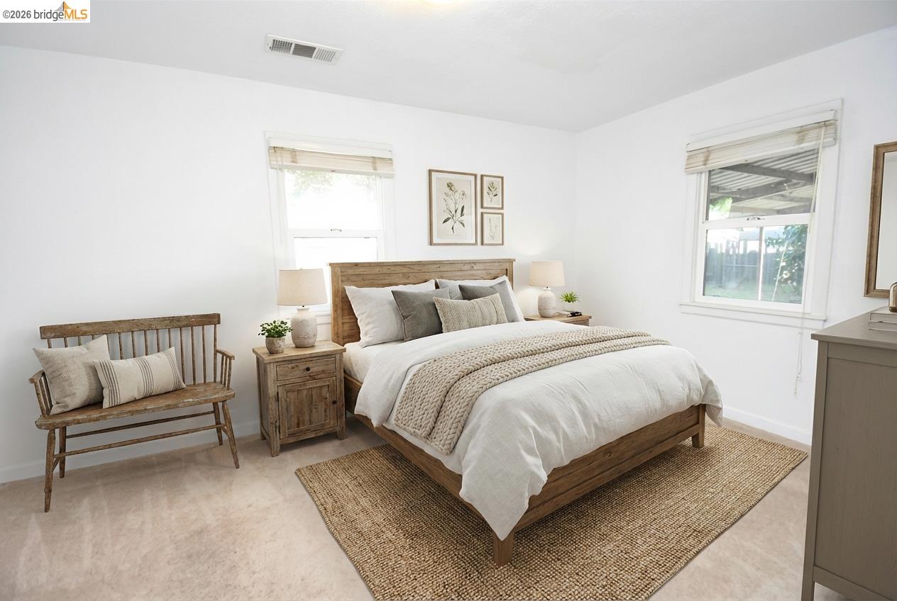 5100 Kiernan Avenue Salida, CA 95368 - Photo 33 of 45 a bedroom with a bed and a couch