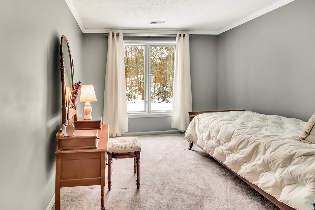 2 Kingman Road Acton, MA 01720 - Photo 15 of 28 a bedroom with a bed and windows