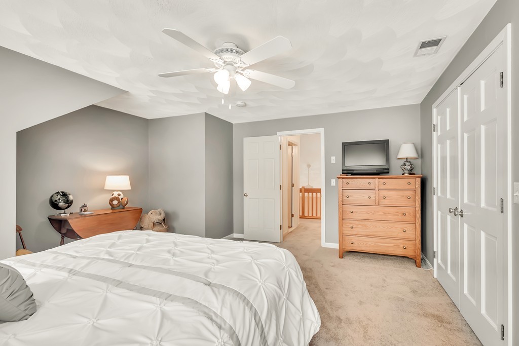 2 Kingman Road Acton, MA 01720 - Photo 17 of 28 a bedroom with a bed and furniture