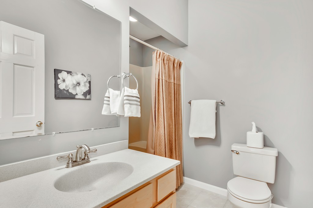 2 Kingman Road Acton, MA 01720 - Photo 18 of 28 a bathroom with a sink toilet and shower