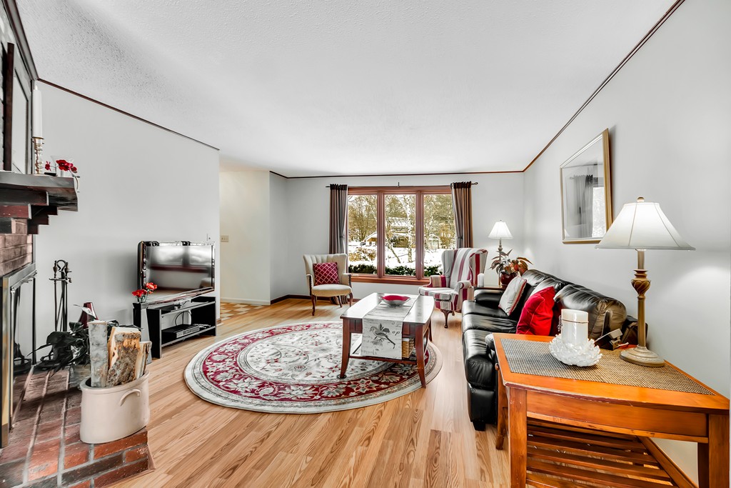 2 Kingman Road Acton, MA 01720 - Photo 5 of 28 a living room with furniture and a wooden floor