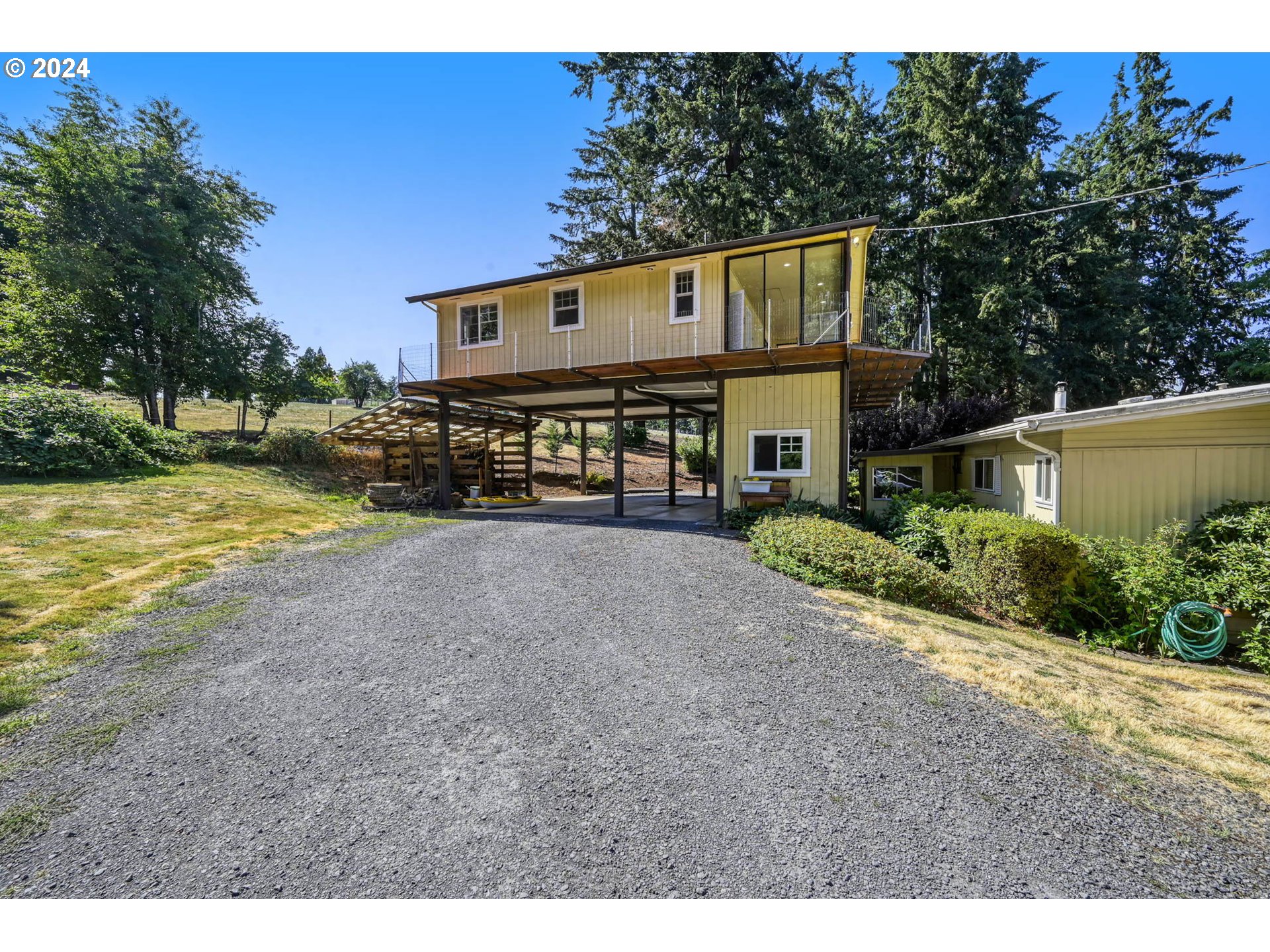 85261 Ridgeway Road Pleasant Hill, OR 97455 - Photo 5 of 47 a view of a house with backyard and sitting area