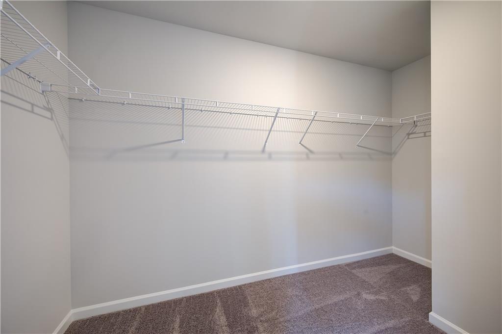 305 Exeter Court Stockbridge, GA 30281 - Photo 22 of 27 a view of a room with racks on the wall