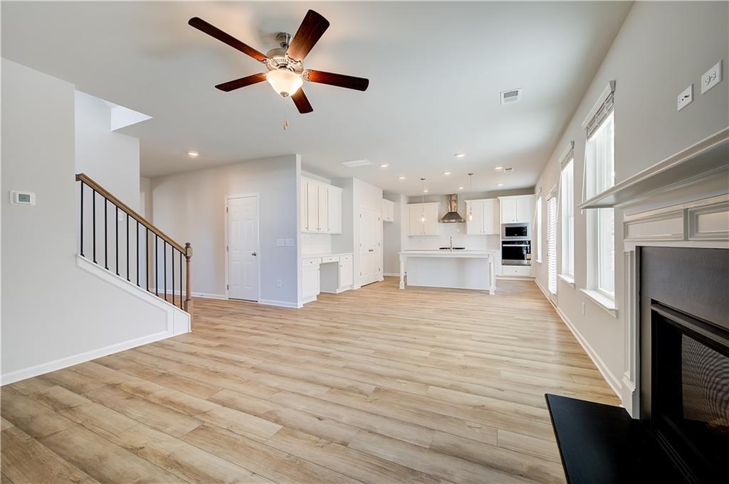 305 Exeter Court Stockbridge, GA 30281 - Photo 10 of 27 a view of an empty room with a kitchen