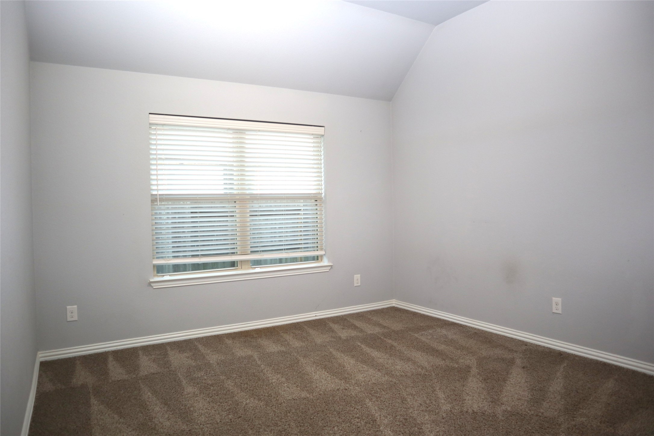 4553 New Country Drive Spring, TX 77386 - Photo 15 of 36 an empty room with a window