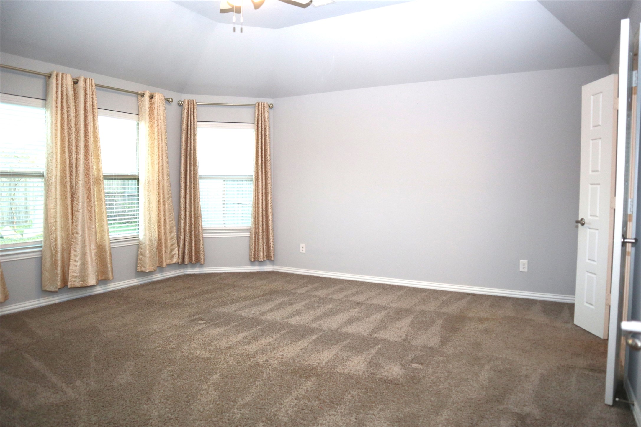 4553 New Country Drive Spring, TX 77386 - Photo 18 of 36 a view of an empty room with a window