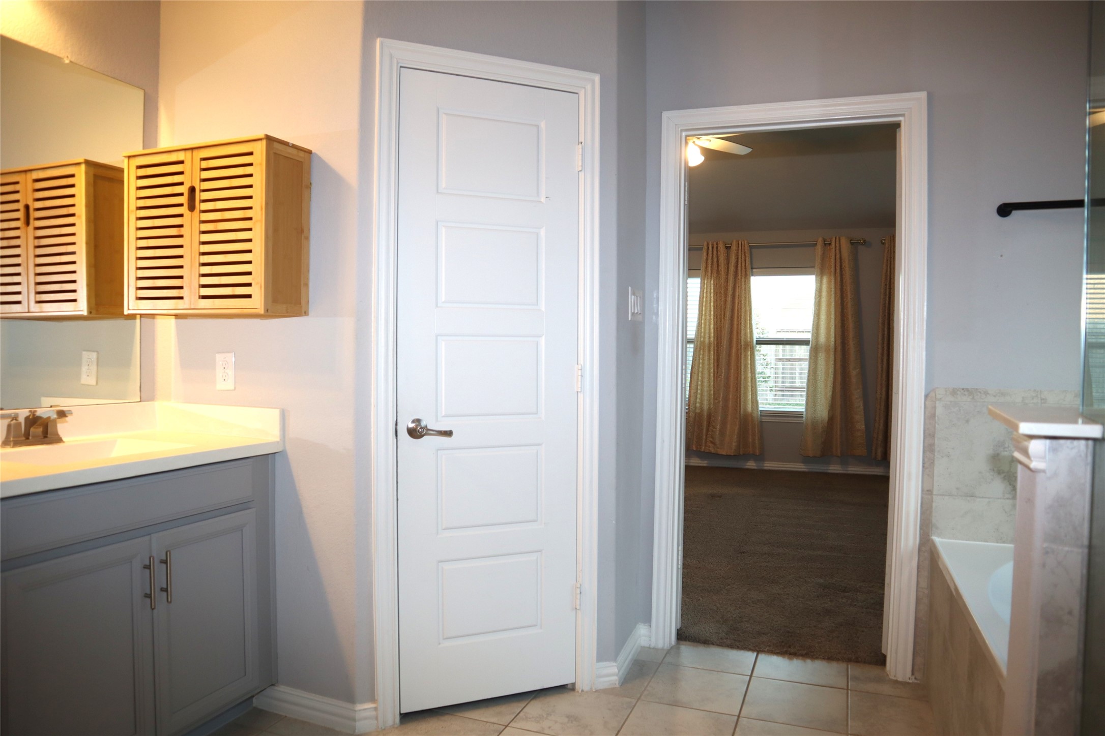 4553 New Country Drive Spring, TX 77386 - Photo 22 of 36 a bathroom with a sink and a shower