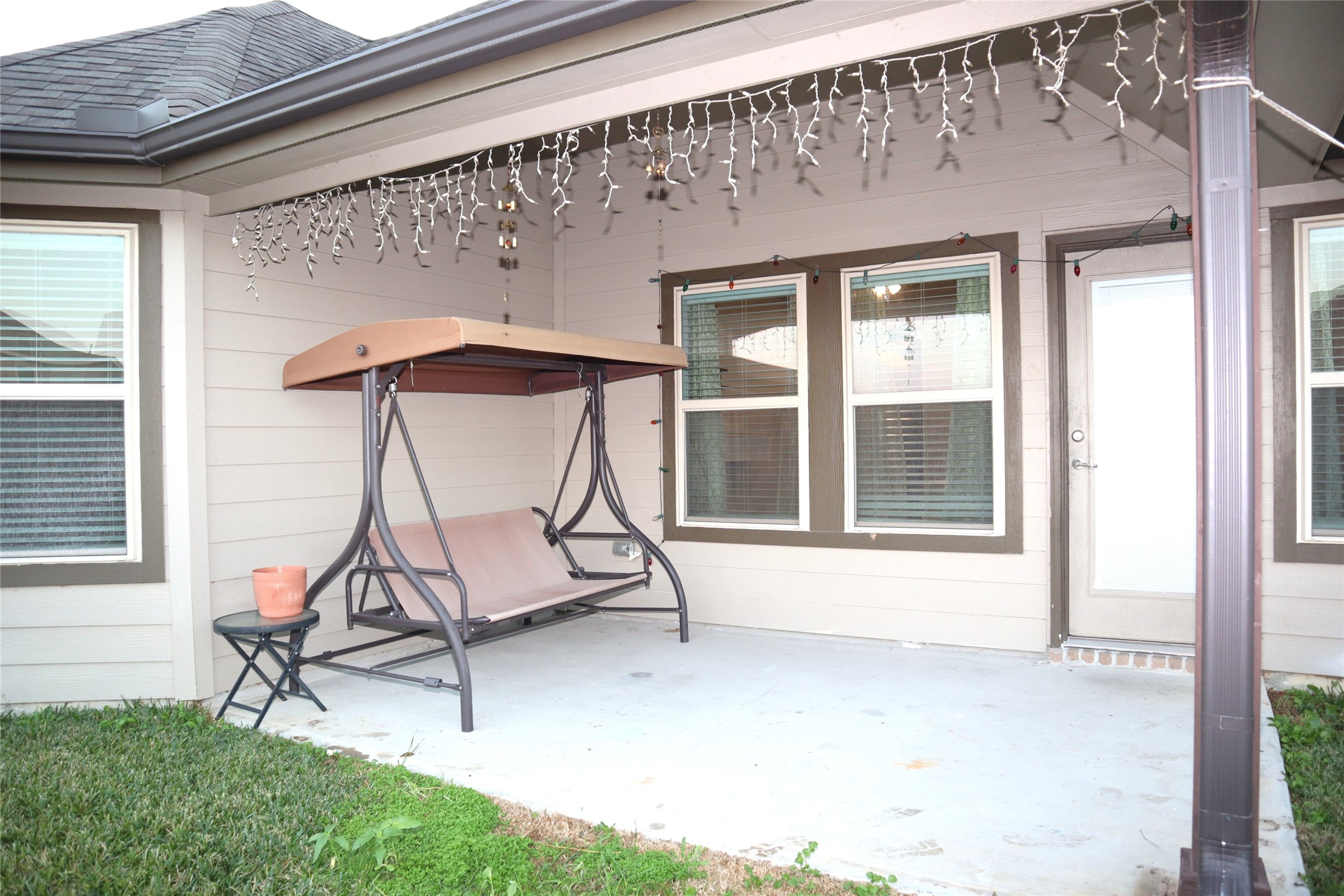 4553 New Country Drive Spring, TX 77386 - Photo 30 of 36 a bench sitting in front of a house