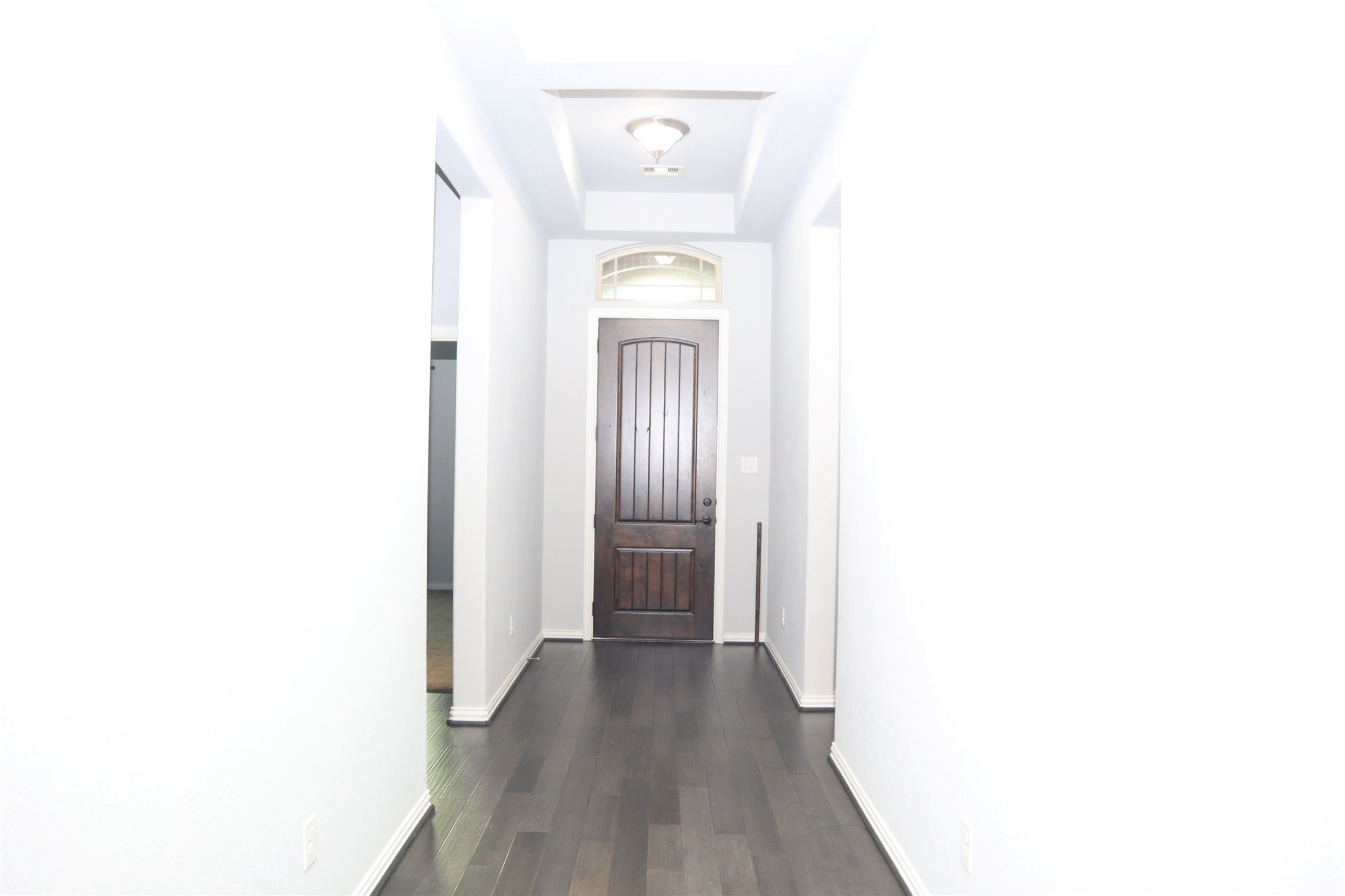 4553 New Country Drive Spring, TX 77386 - Photo 4 of 36 a view of a hallway with wooden floor