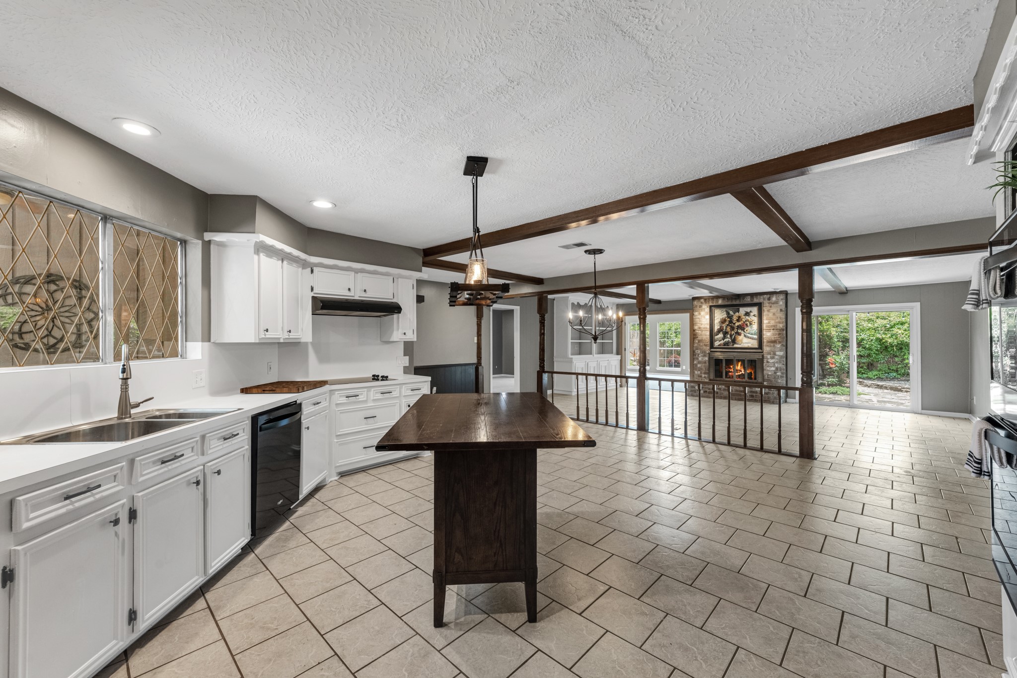 622 South Rivershire Drive Conroe, TX 77304 - Photo 16 of 44 a kitchen with stainless steel appliances granite countertop a stove a sink dishwasher and a refrigerator