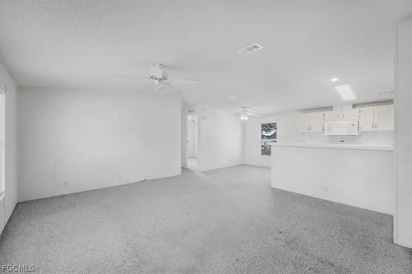 a view of a kitchen with a sink and dishwasher kitchen view