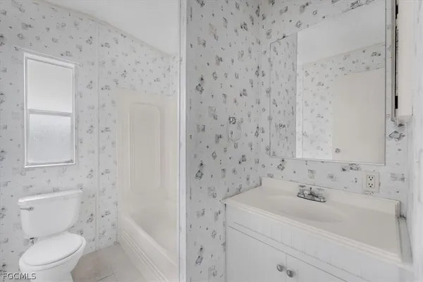 a bathroom with a sink and a toilet